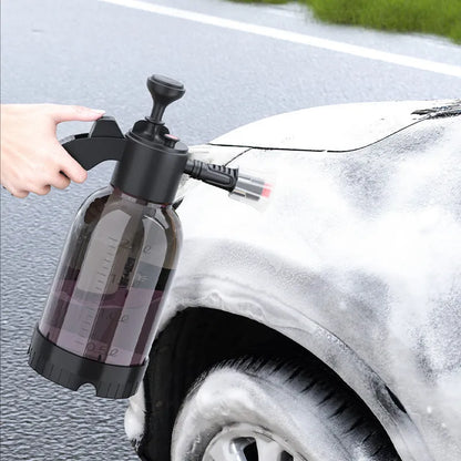 Black 2-litre hand-held foam sprayer with pump handle and two nozzles for car washing and gardening.