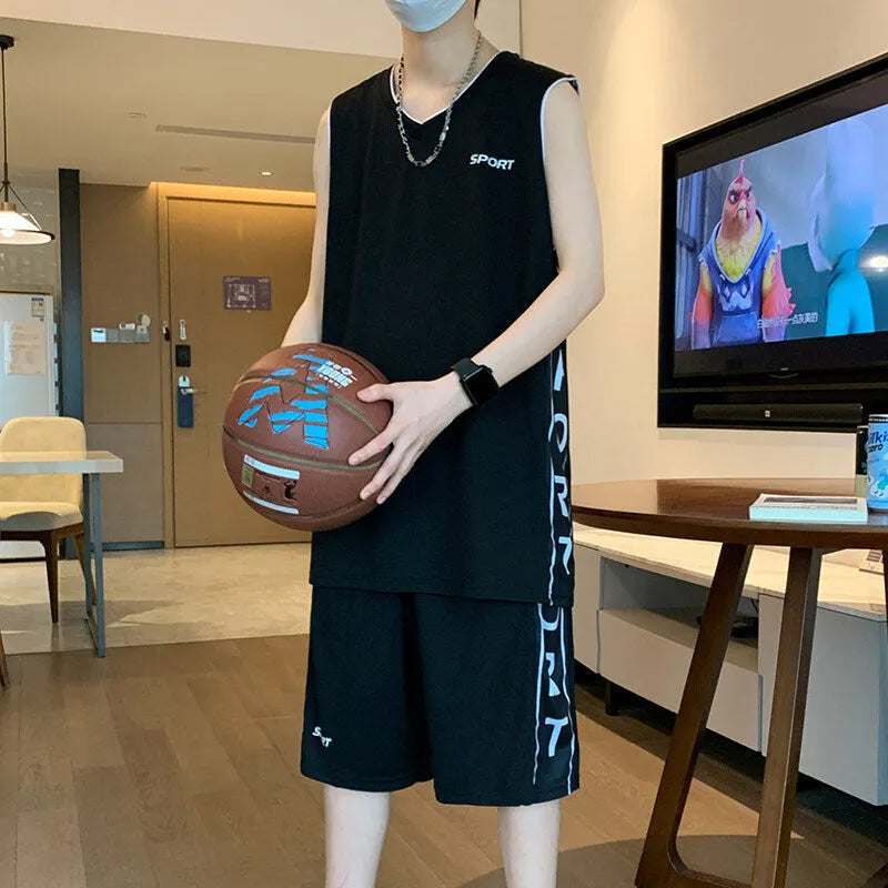 Men's thin polyester basketball sports suit consisting of a sleeveless vest and short pants on a hanger.