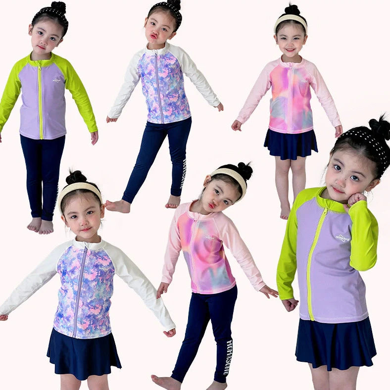 Girls' long sleeve swimsuit with split skirt in gradually varied pink colour, showing complete arm coverage and skirt design