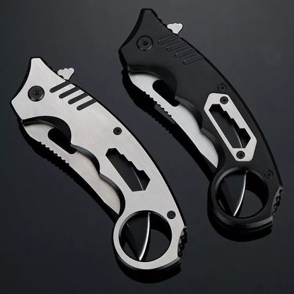 Folding knife with nut driver and back clamp for outdoor survival