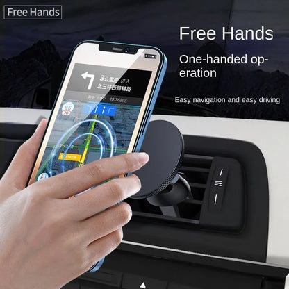 Black aluminium alloy magnetic phone holder clipped onto a car air vent, holding a smartphone securely.