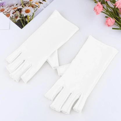 Manicure gloves with UV protection, featuring a stylish half-finger design and hand-painted finish for a comfortable and functional at-home nail care experience.