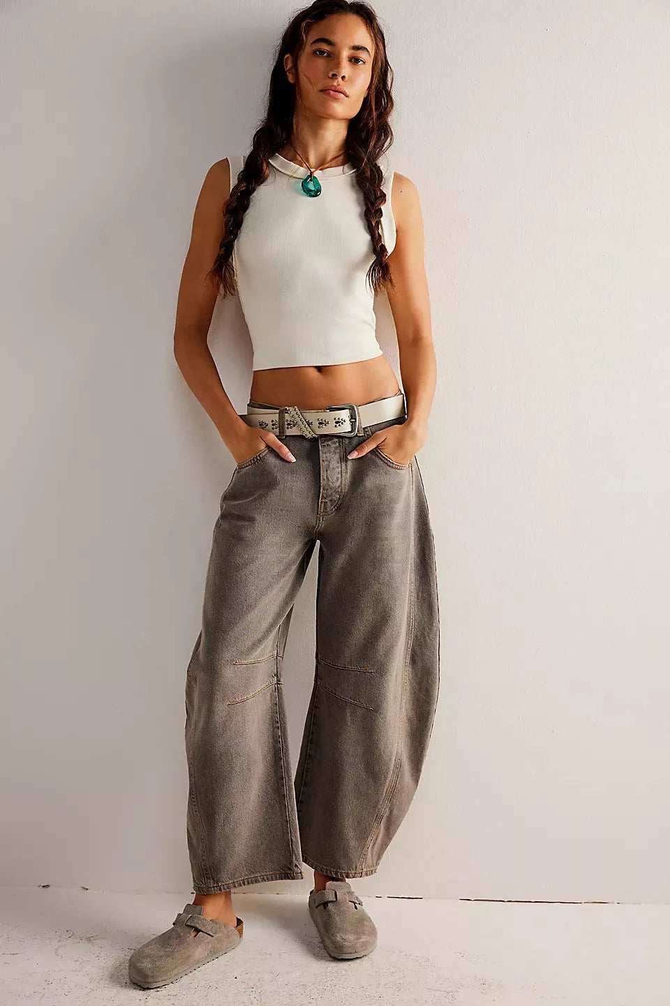 Women's mid-rise barrel jeans with wide leg design in various colors