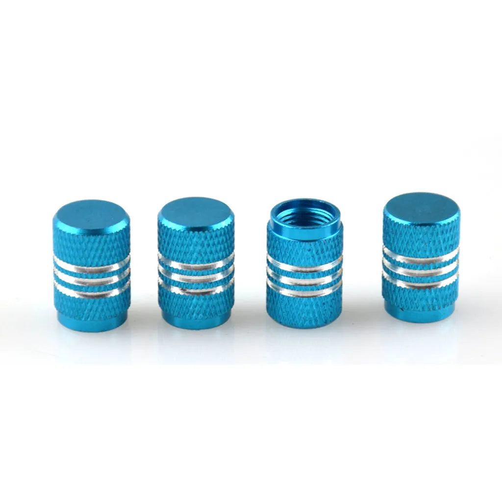 Set of stainless steel car tyre valve caps in multiple colours: black, red, blue, gold, silver, green, purple, sky blue, grey, orange.