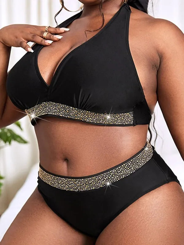 Black plus size women's bikini set on a mannequin, showing the bra and shorts.