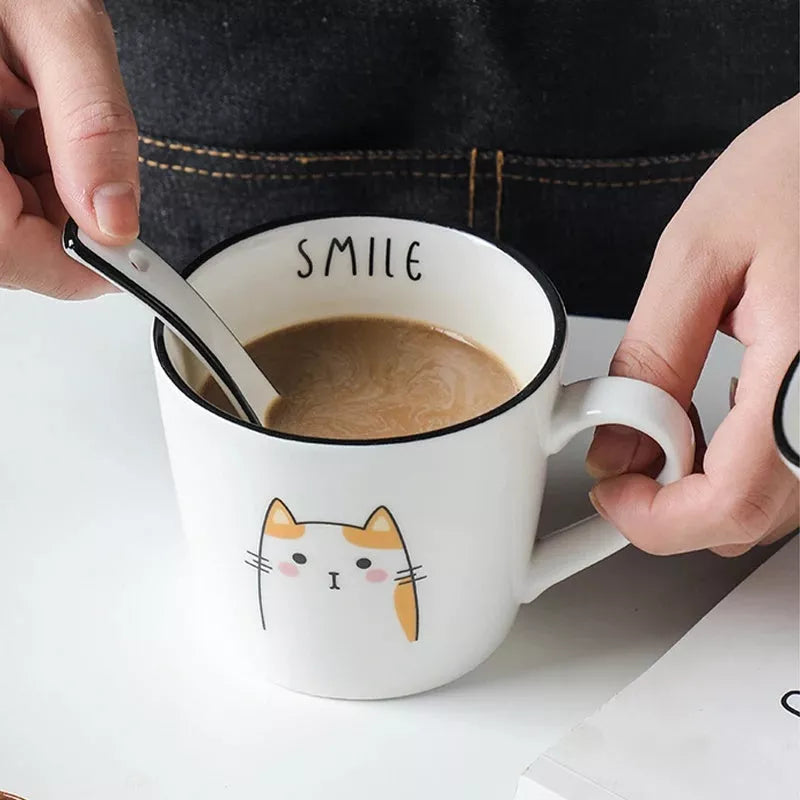 Ceramic coffee cup with cartoon cat design, perfect for couples and coffee enthusiasts