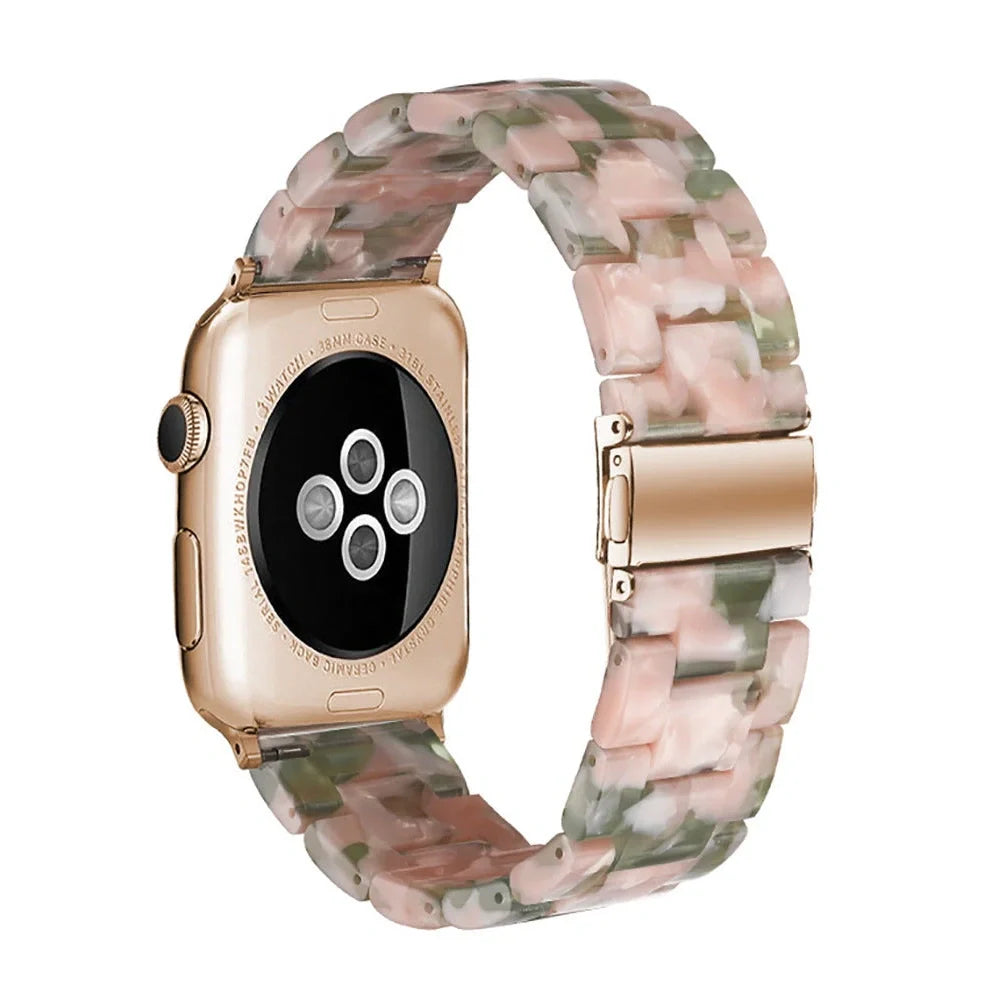 Slim resin Apple Watch strap showing attachment mechanism and colour options