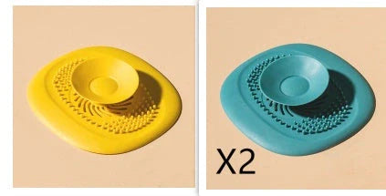 TPR vortex design sink drain cover in twilight orange, quiet blue, mango yellow, and gentian green