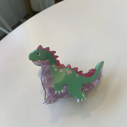 Acrylic dinosaur jaw clip hairpin showing six colour variations: pink, green, purple, blue, brown