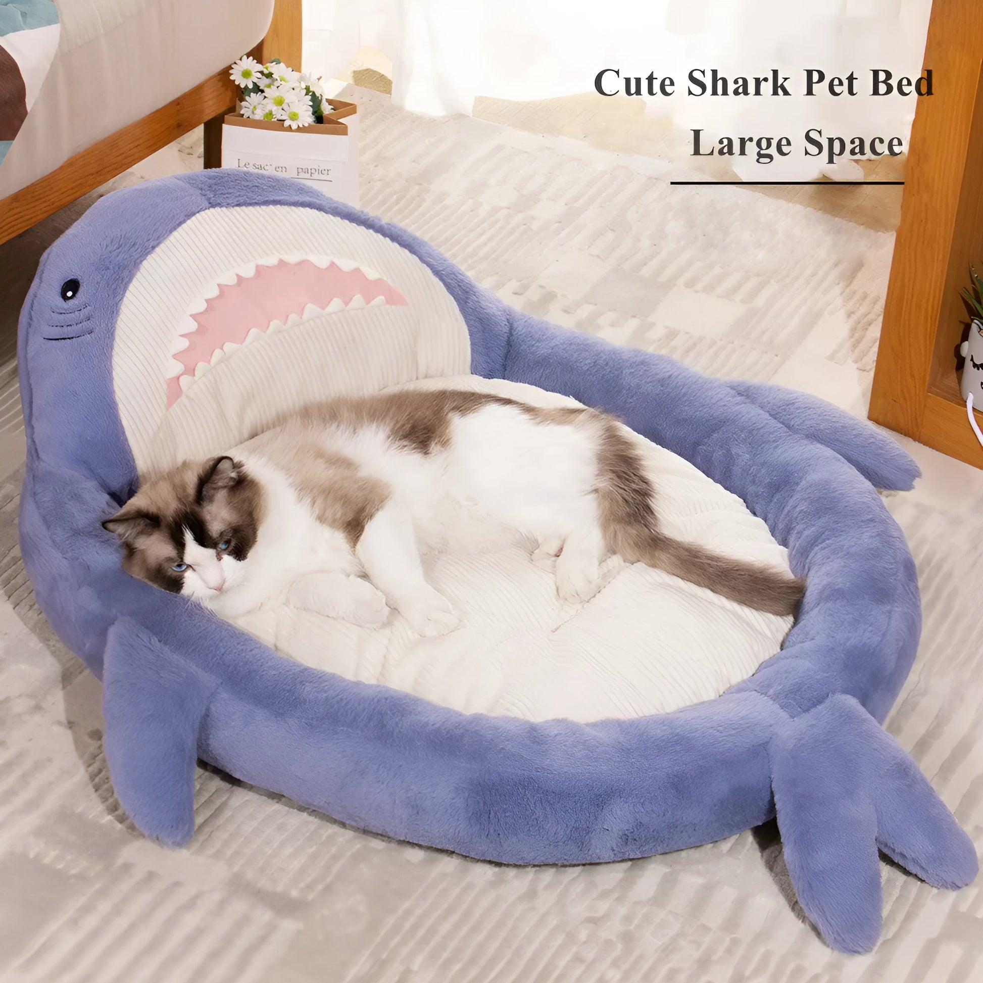 Blue shark pattern pet bed for dogs with soft velvet fabric and anti-slip base.