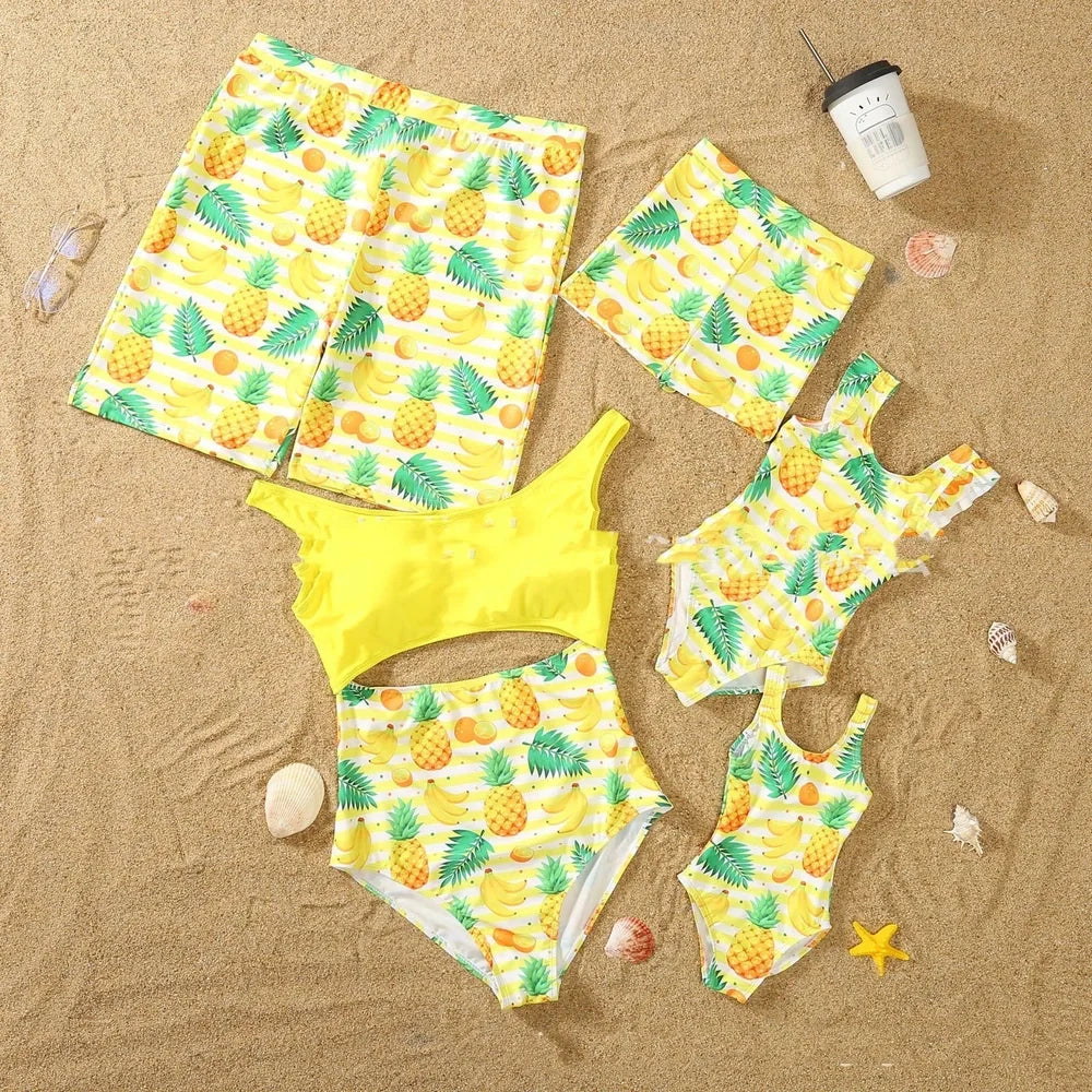 Parent and child matching quick-dry swim sets in green, pink, red colours with swimsuits and trunks