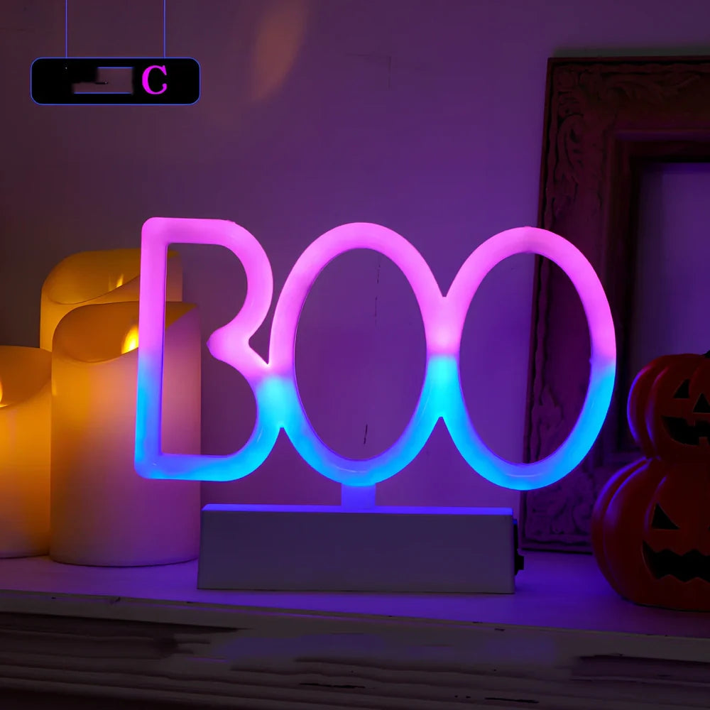 Set of nine glowing Halloween pumpkin lanterns in varying sizes from 14.5cm to 23cm height with plastic construction