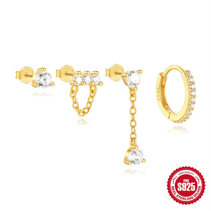 A pair of geometric clover petal shaped earrings in gold, made from S925 sterling silver with an electroplated finish.