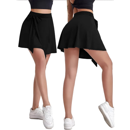 Black thigh-length sports skirt with high waist and attached shorts, showing shoulder strap detail.