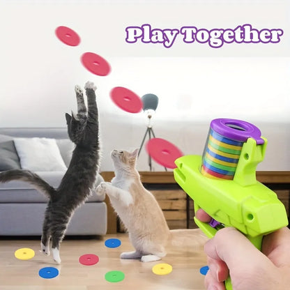 Green battery-free cat toy launcher with foam disc for interactive pet play