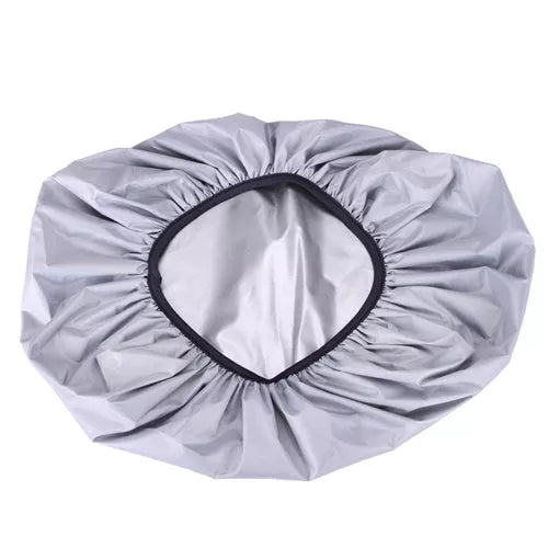 Waterproof backpack cover in various colors, showing elastic edge and compact fold