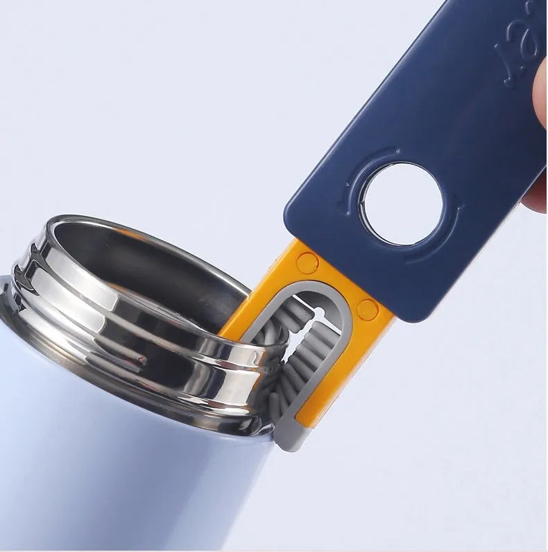 Blue and grey 4-in-1 multifunctional bottle and cup cleaning brush set with silicone, wire, and bristle heads.