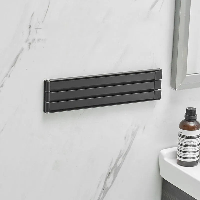Nordic style black or white carbon steel towel rack with no-drill installation for bathrooms.