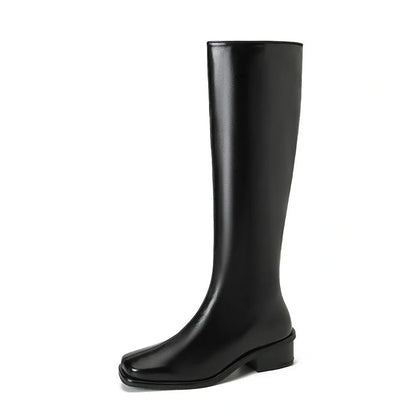 Black square toe over-the-knee boots with 4cm chunky heel showing leather interior and rubber sole
