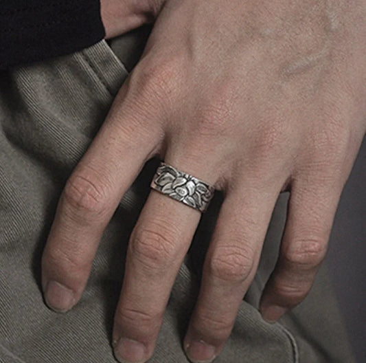 Handcrafted Thai sterling silver ring with intricate Heart Sutra engraving, promoting mental clarity and emotional balance.