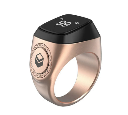 Zikr1 smart ring in metal with OLED display showing time and Tasbih count, sizes 18mm-22mm