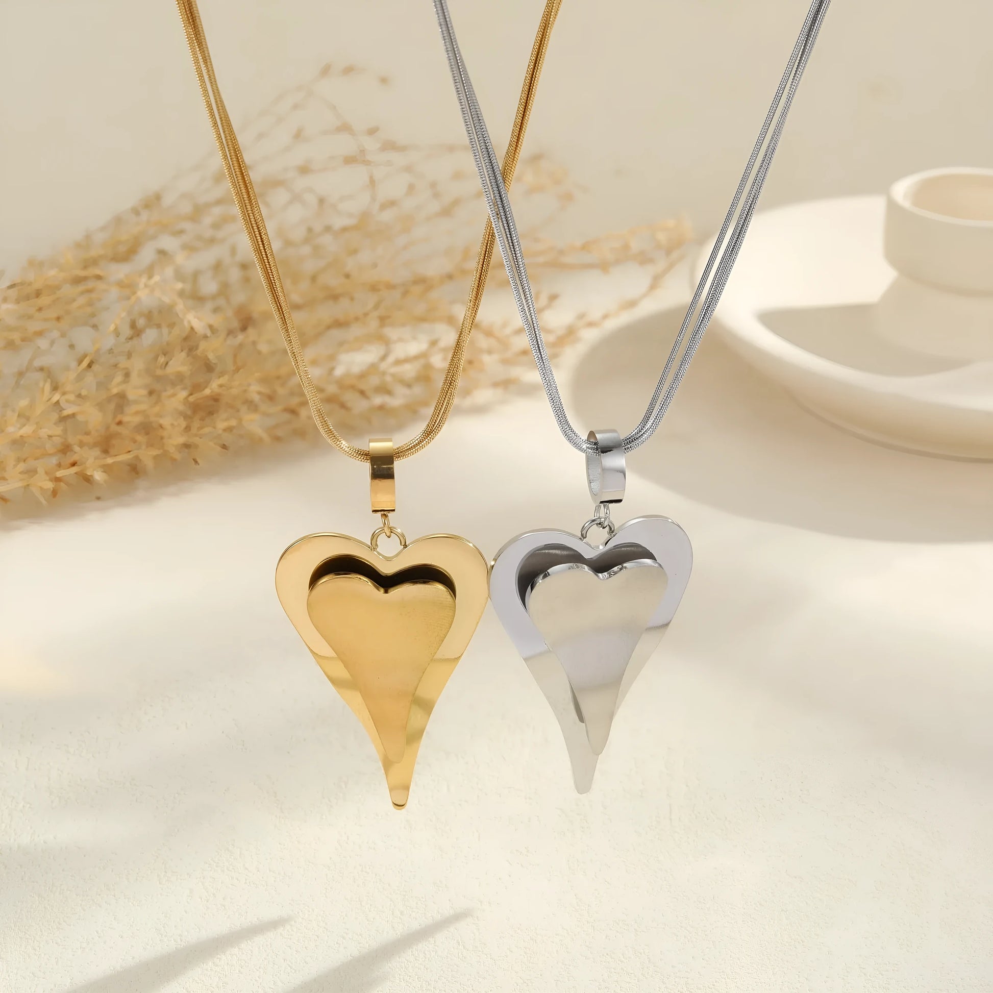 Women's stainless steel double heart necklace with snake bones chain, 18K electroplated in gold or steel finish