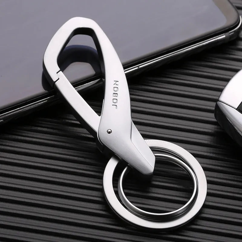 Zinc alloy double ring key chain measuring 8.3x3.5cm with black finish and modern simplicity design