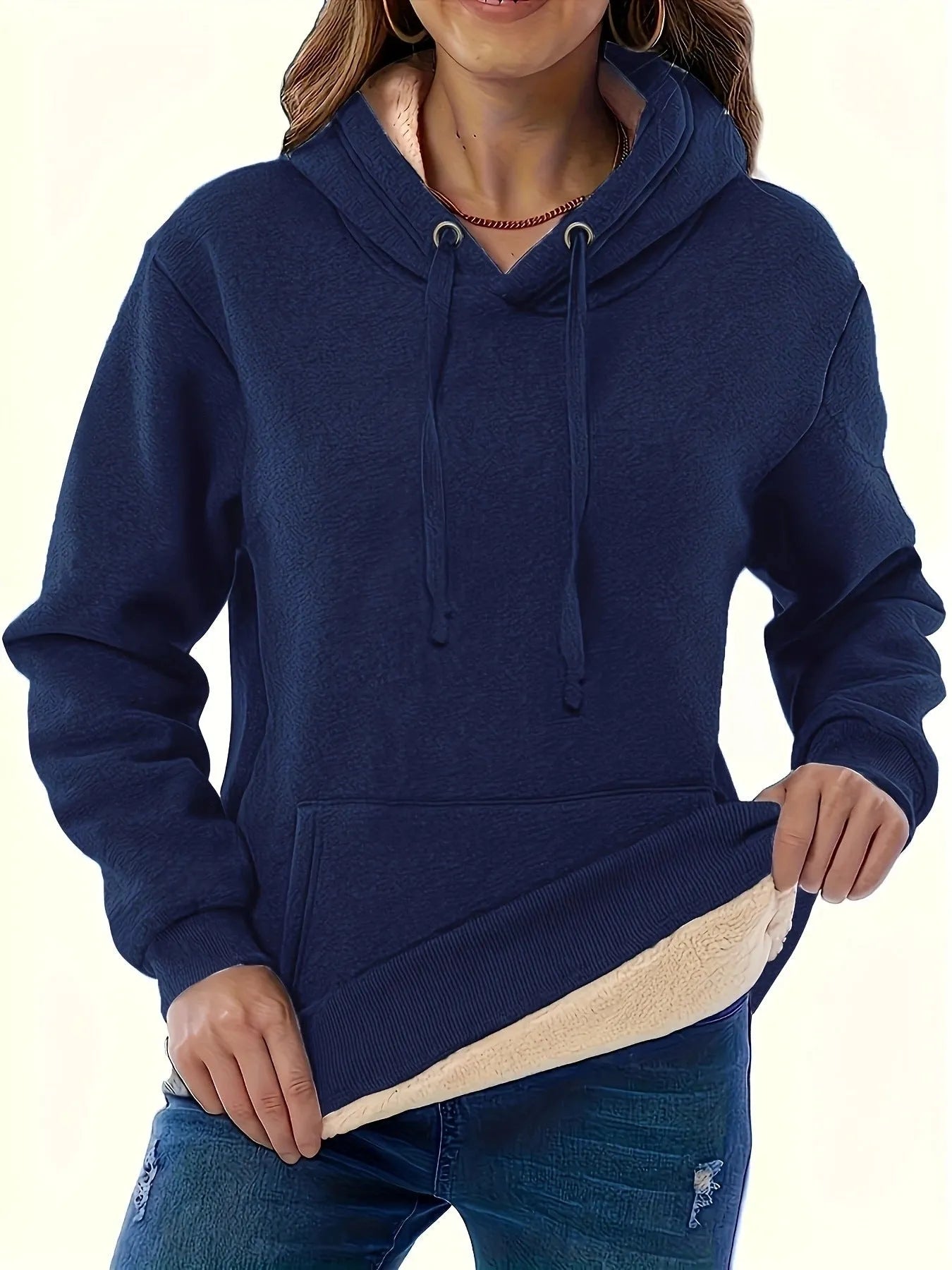 Women's loose fit hooded sweater in thick grey polyester fleece with 3D pattern and front pockets.