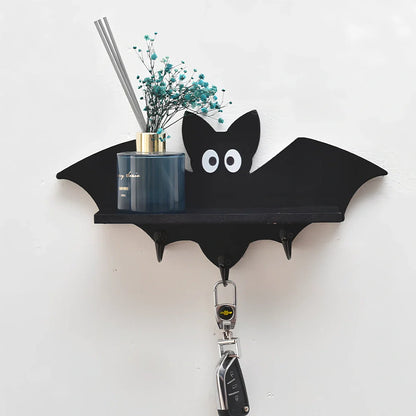 White pine animal-shaped wall shelf measuring 35cm wide by 17cm high on wall