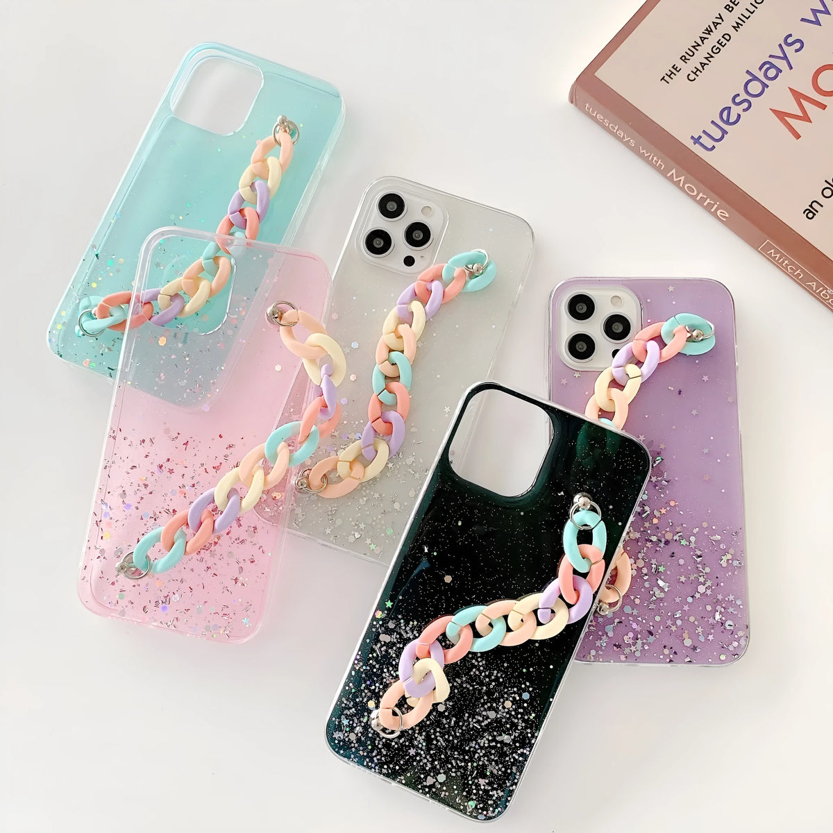 Silicone soft cover phone case with bracelet starry design in transparent, black, pink, or green for iPhone 14 and 15