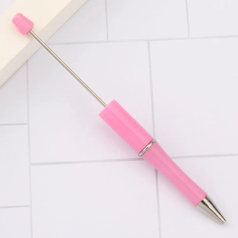 Rotating bead ballpoint pen in gradient colour with ABS plastic and steel wire construction