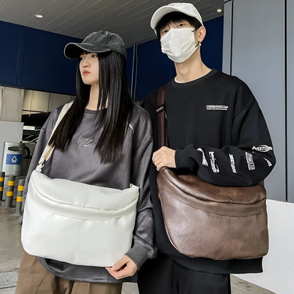 Retro style brown men's crossbody messenger bag showing storage compartments and 50cm width dimensions
