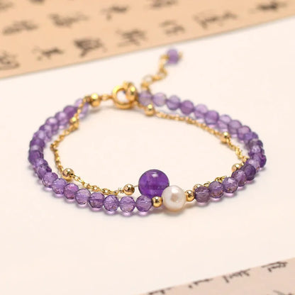 Amethyst colour crystal women's bracelet with diamond cut shapes and Chinese style design