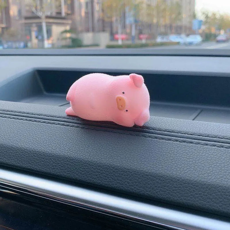 Resin cartoon pig car decoration in various styles, approx 8-10cm, for dashboard personalisation