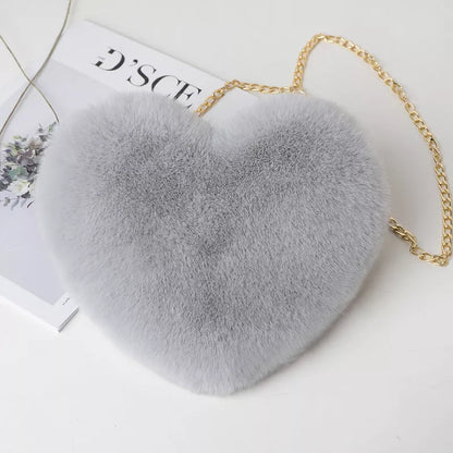 Women's plush chain shoulder bag with heart shape design in various colors