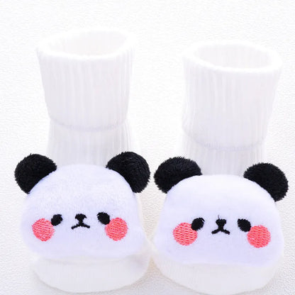 Cotton baby floor socks in assorted colours and patterns including bows, stars, and animal designs.
