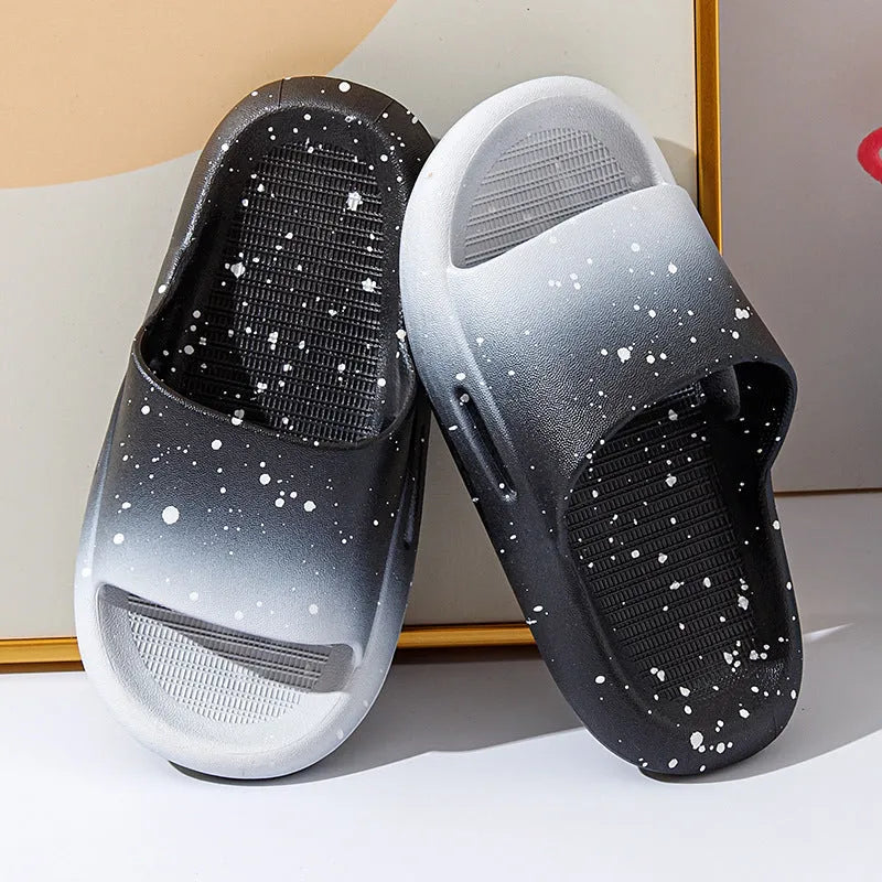 Gradient blue PVC slipper for children on a white background, showing non-slip sole.