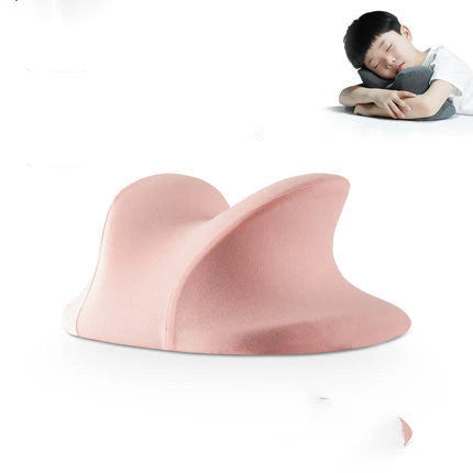 Ergonomic memory foam nap pillow with unique 'butterfly' shape design for comfortable desk or classroom power naps