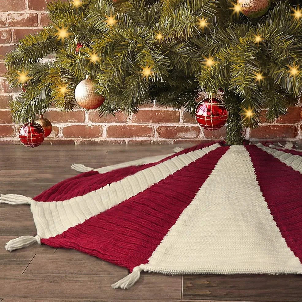 Red and white knitted Christmas tree skirt measuring 122cm square with tassel decoration