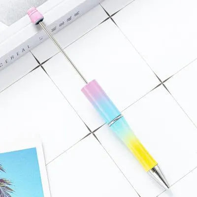 Rotating bead ballpoint pen in gradient colour with ABS plastic and steel wire construction