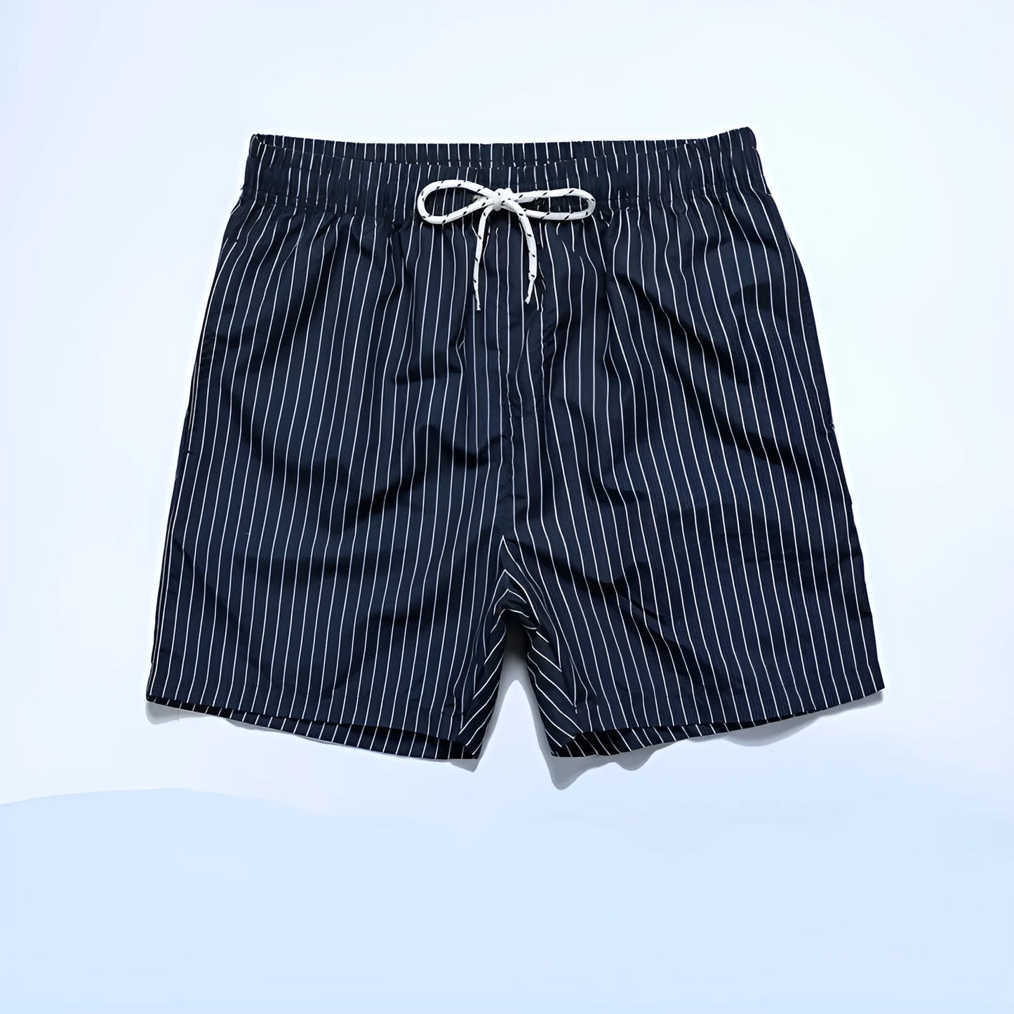 Pair of grey striped polyester shorts with a straight leg cut on a mannequin