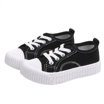 Korean style children's canvas shoes in black, red, yellow or white with non-slip rubber soles