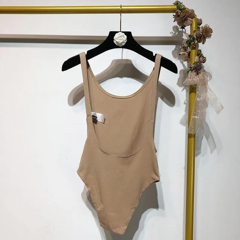 Backless sling jumpsuit for women, slim fit polyester, short 40cm length, black white khaki orange, sizes S M L