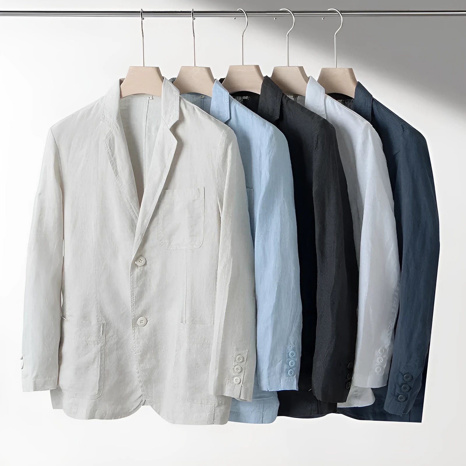 Men's loose fit linen suit jacket in solid colours showing long sleeves and casual styling