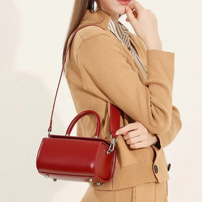 Genuine cowhide leather women's crossbody bag with clamshell opening and internal organisation compartments