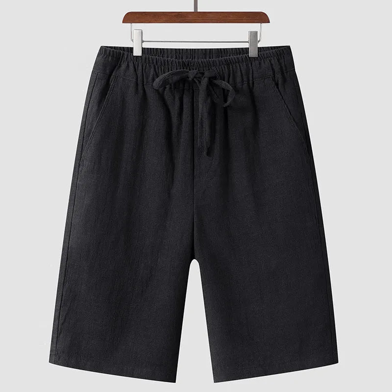 Men's linen casual shorts with elastic waistband in loose cropped design showing beige colour option