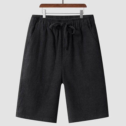 Men's linen casual shorts with elastic waistband in loose cropped design showing beige colour option