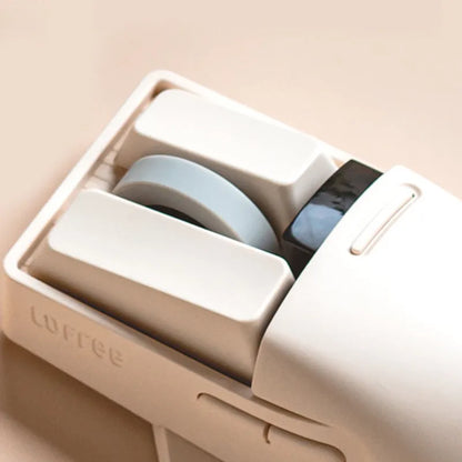 Xiaoqiao wireless mouse in tofu colour with ergonomic shape and four-way roller on desk