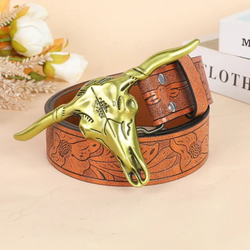 Men's brown imitation leather belt with an embossed alloy cow head pin buckle fastened on trousers.