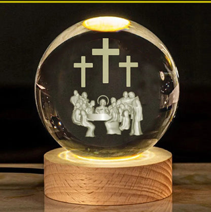 White crystal ball ornament with solid wood warm light base, showing purity engravings like Cross and Maria for desk decor
